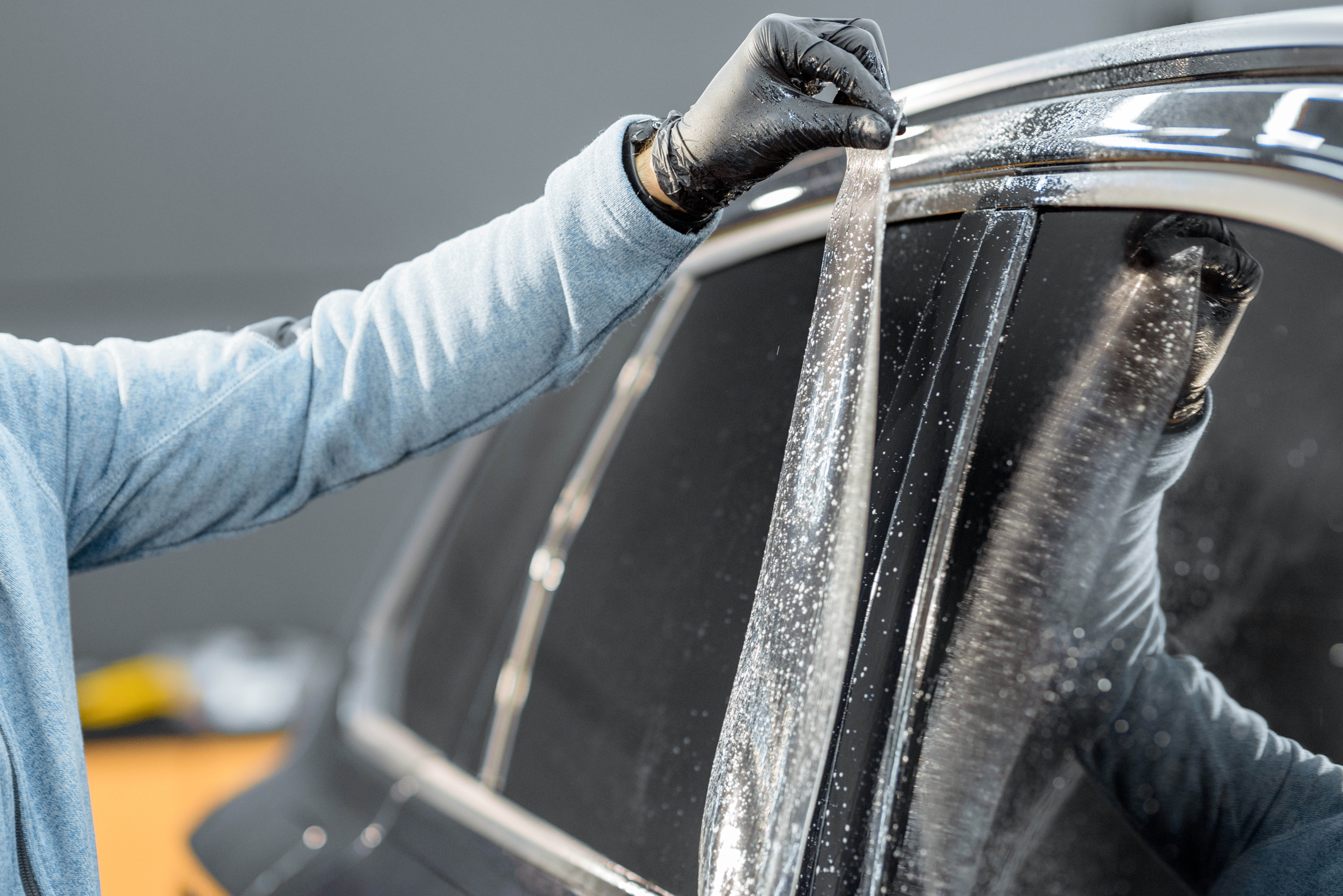Paint protection film applied to a vehicle hood